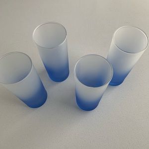 Set of 4 frosted blue tall 8 oz glasses.